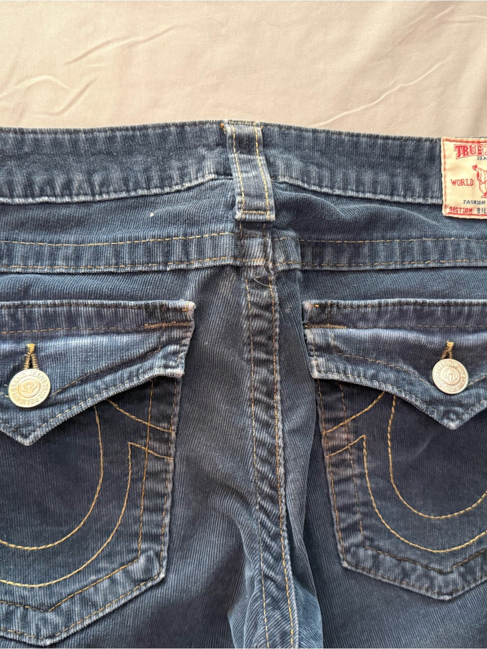True Religion Dark Blue “Billy” Corduroy Bootcut Jeans with Contrast Stitching
